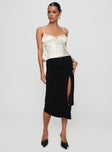   side view of model wearing Princess Polly Venissa Ruched Midi Skirt Black Midi Skirts 