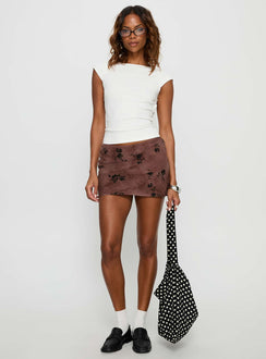   front view of model wearing Princess Polly Piazia mini skirt Brown Floral Mini Skirts 