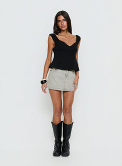   side view of model wearing Princess Polly Nicolina Low Rise Denim Mini Skirt Washed Grey Mini Skirts 