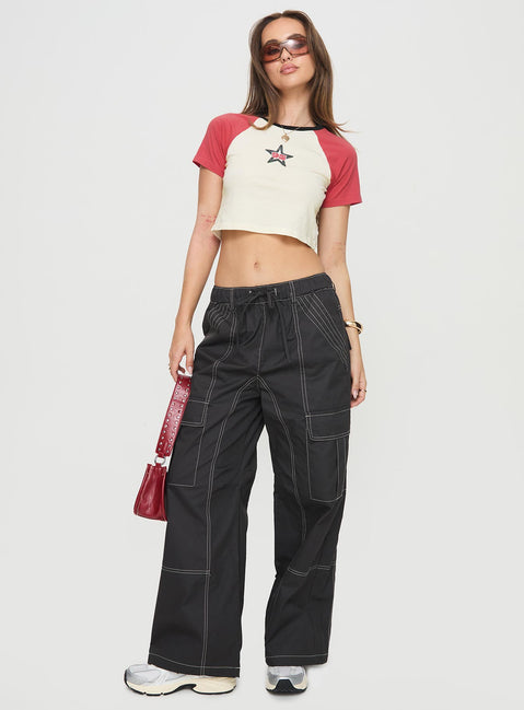 front view of model wearing Princess Polly Soria Cargo Pants Black Low Rise Pants 