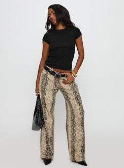 side view of model wearing Princess Polly Prestige Longline Baby Tee Black Short Sleeves High Neck 