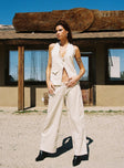 side view of model wearing Princess Polly Kiaan Low Rise Wide Leg Pants Cream Low Rise Pants 