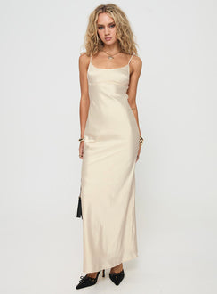 front view of model wearing Princess Polly Ravia Maxi Dress Champagne Square Neck 