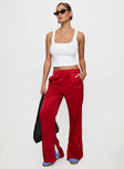 front view of model wearing Princess Polly Travalta Satin Track Pant Red Low Rise Pants 