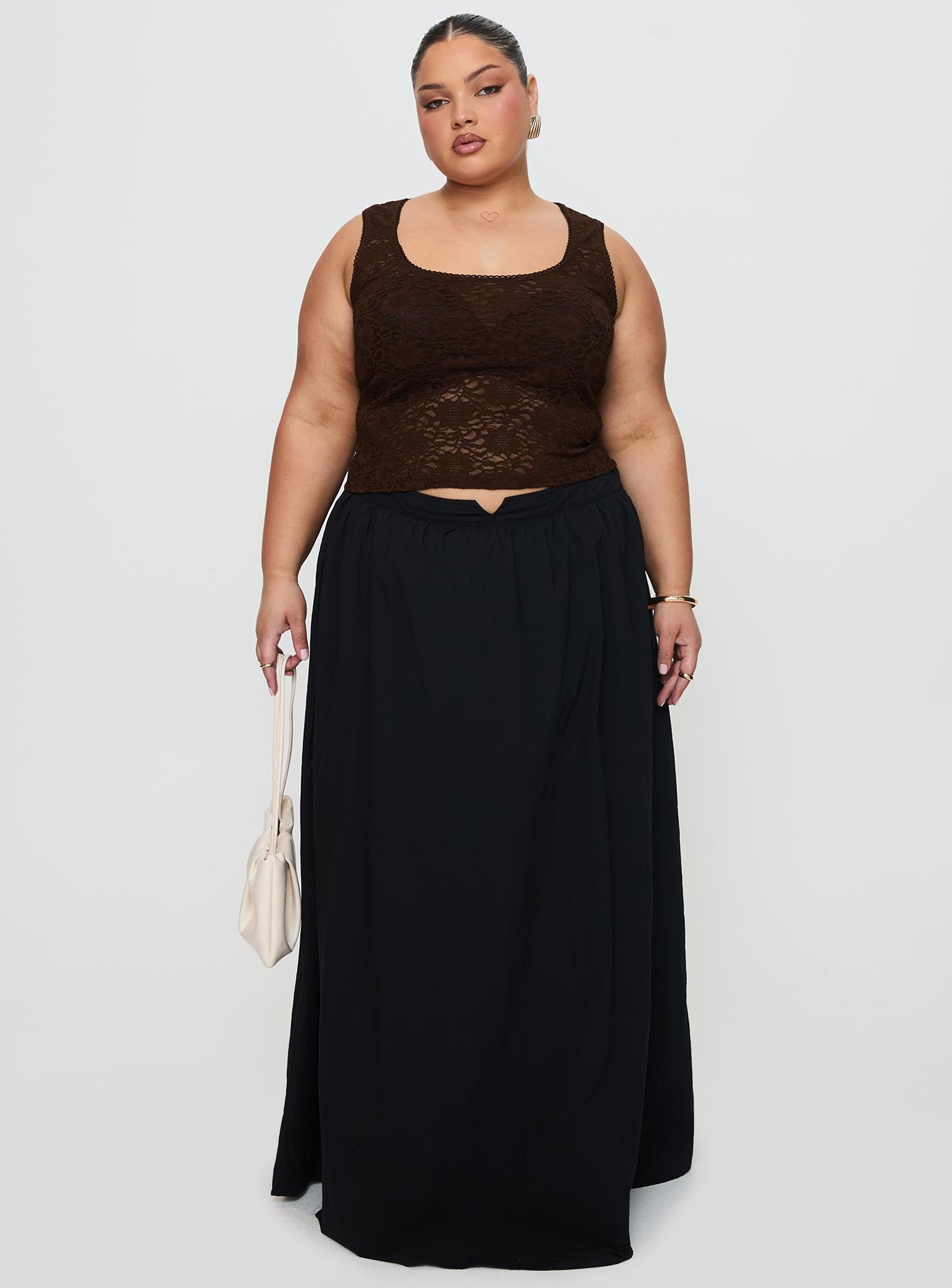   side view of model wearing Princess Polly Rennata Gathered Mid Rise Maxi Skirt Black Maxi 