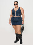 side view of model wearing Princess Polly Edenette Top Mid Blue Wash Curve Sleeveless Plunger 