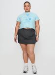 side view of model wearing Princess Polly Cheers To You Tee Blue Curve Short Sleeves Crew Neck 