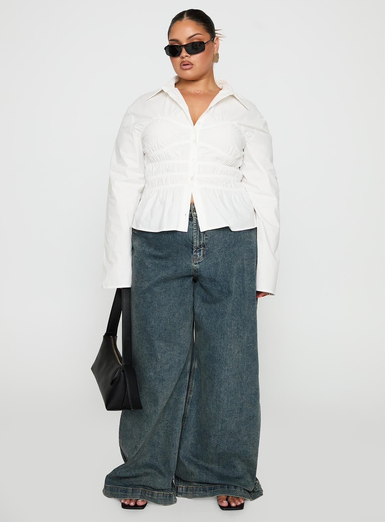 front view of model wearing Princess Polly Liesel Shirred Long Sleeve Top White Curve Full Sleeves V-Neck 