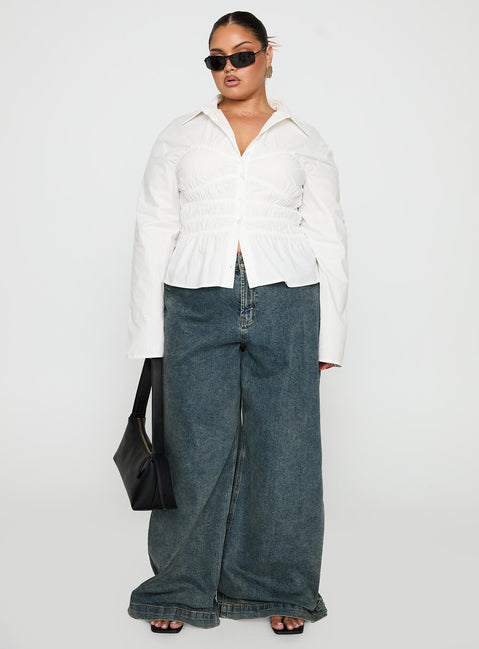 front view of model wearing Princess Polly Liesel Shirred Long Sleeve Top White Curve Full Sleeves V-Neck 
