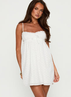 back view of model wearing Princess Polly Marliene Broiderie Mini Dress White Sweetheart Neckline 
