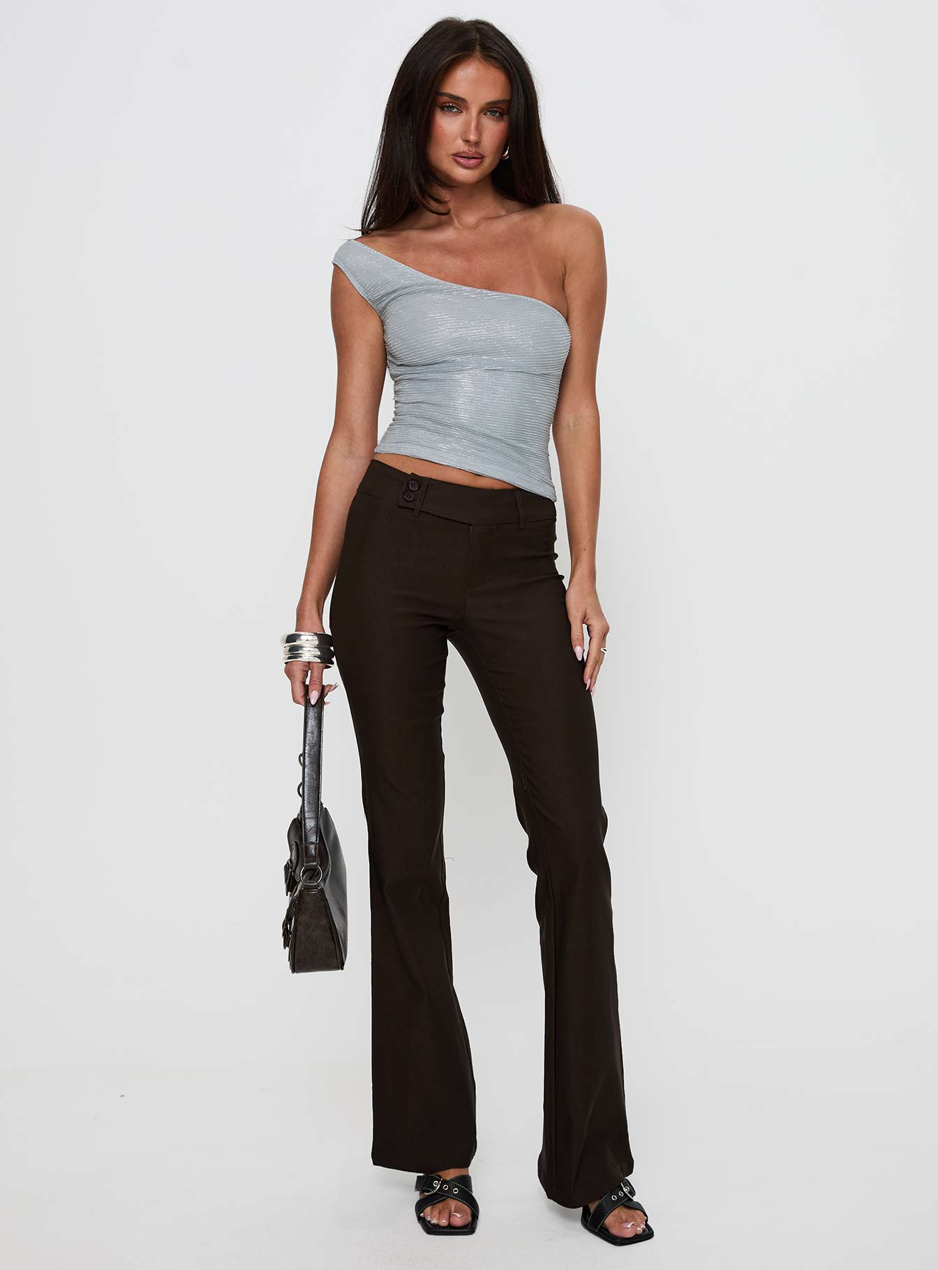 front view of model wearing Princess Polly Kinkirk Flared Pants Chocolate Low Rise Pants 