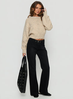 side view of model wearing Princess Polly Slow Ride Mid Rise Bootleg Belted Jeans Washed Black Mid Rise Jeans 