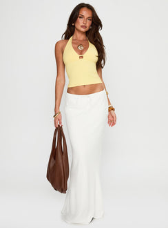 side view of model wearing Princess Polly Impress Me Halter Top Lemon Sleeveless Plunger 