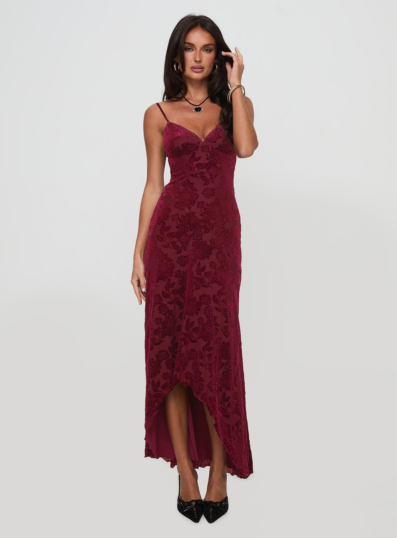 side view of model wearing Princess Polly Rumours Slippy Burnout Maxi Dress Burgundy Sweetheart Neckline 