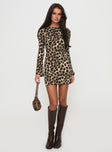 side view of model wearing Princess Polly Carnal Mini Dress Leopard Boat Neck 