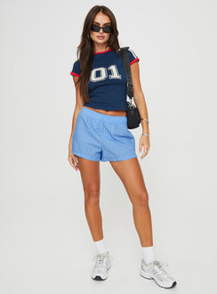 front view of model wearing Princess Polly Maxxy Boxer Shorts Blue Stripe High Waisted Shorts 