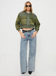 Cropped utility jacket Bomber style, nylon material, button and zip fastening at front, twin chest pockets, ribbed waistband