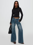 front view of model wearing Princess Polly Laguardia Wide Leg Jeans Dark Blue Wash Mid Rise 