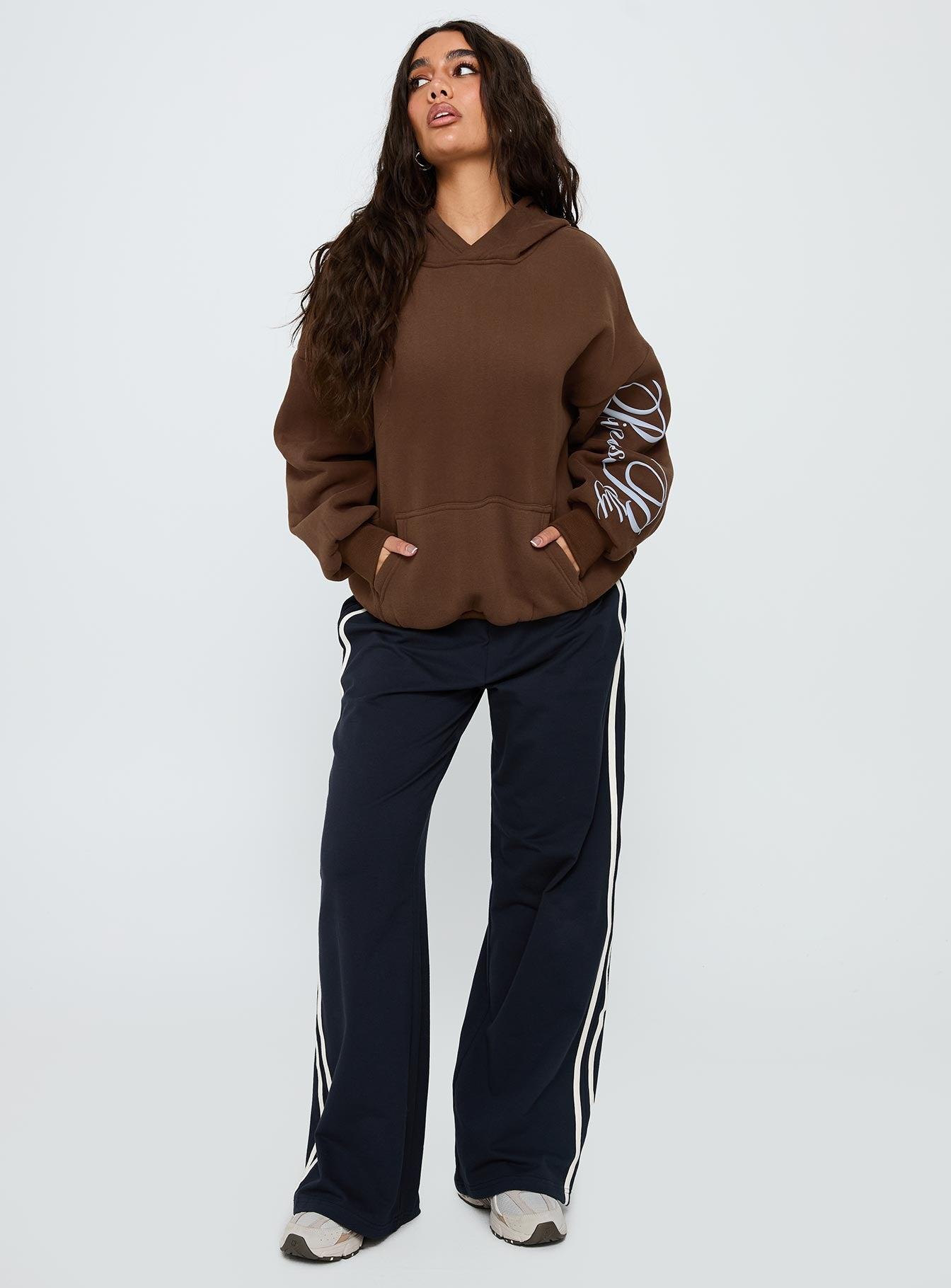 front view of model wearing Princess Polly Princess Polly Script Text Graphic Hoodie Brown / Blue Long 