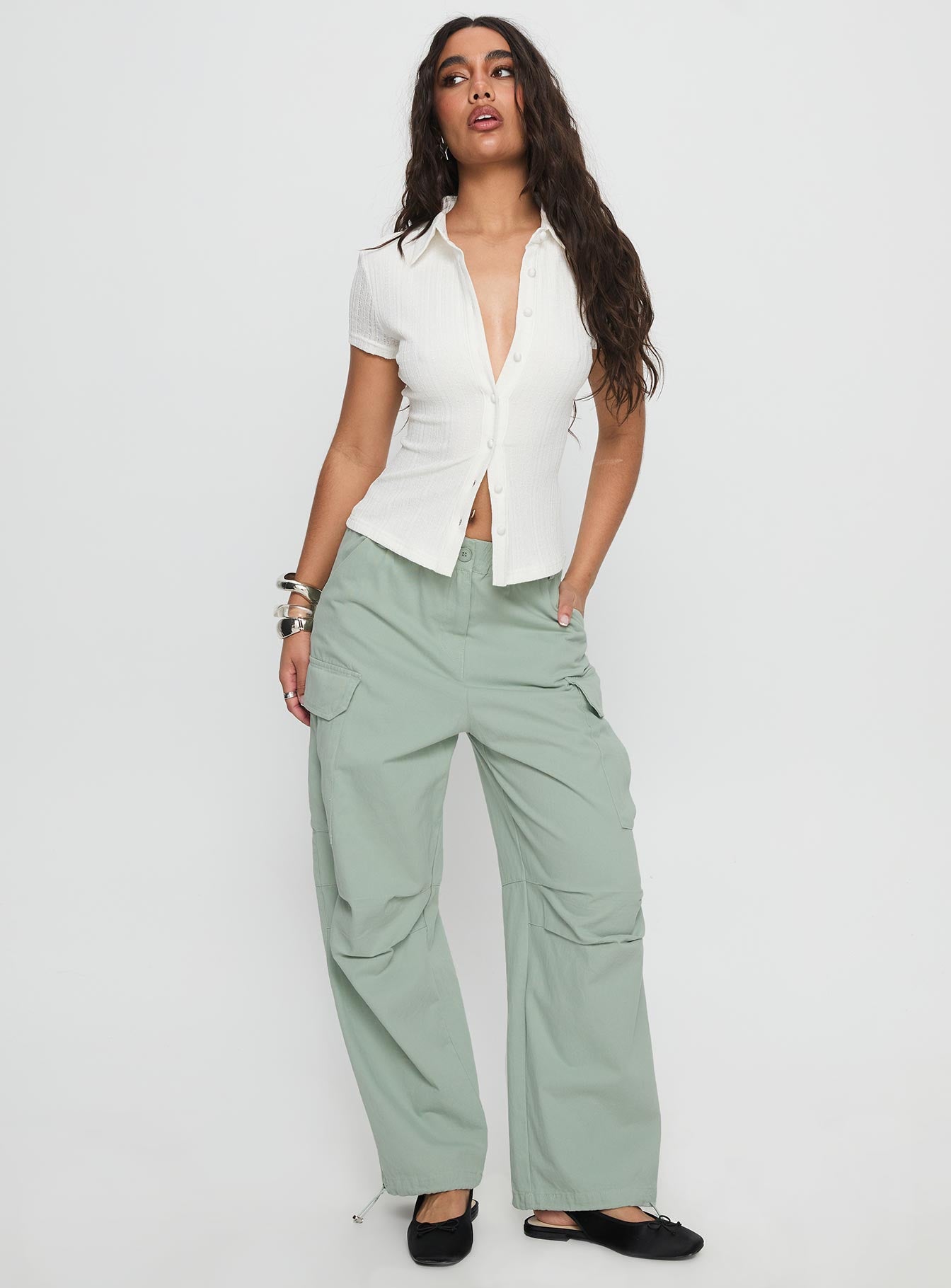 front view of model wearing Princess Polly Elanthea Cargo Pants Green High Waisted Pants 