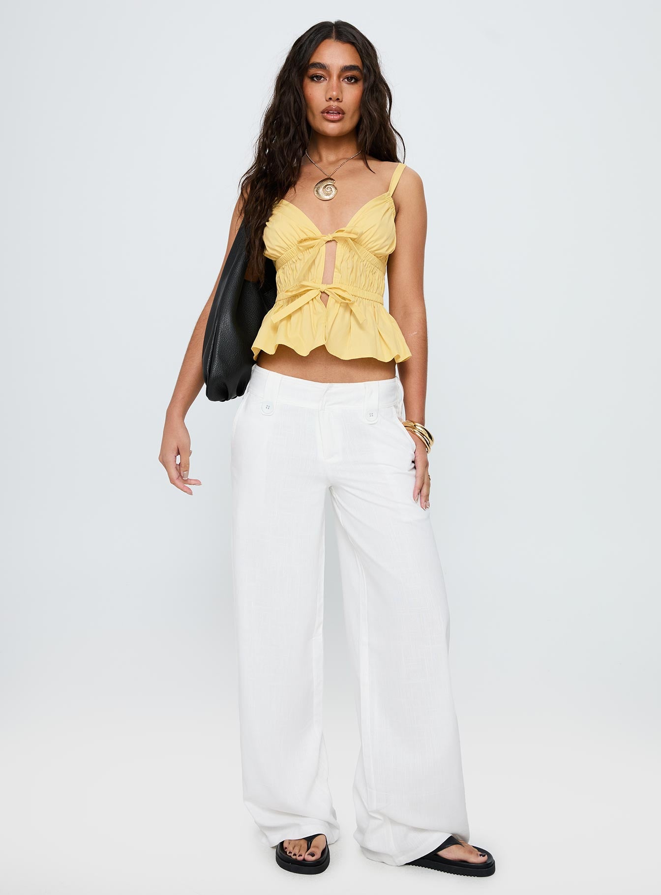 front view of model wearing Princess Polly Pedra Wide Leg Pant White Low Rise Pants 