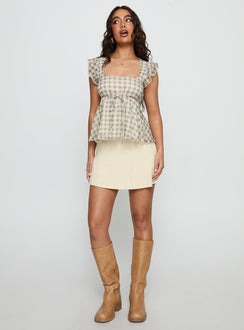   front view of model wearing Princess Polly Another Day Knit Pleat Mini Skirt Butter Yellow Mini Skirts 