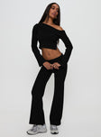 front view of model wearing Princess Polly Sina Off The Shoulder Top Black Full Sleeves Asymmetric Neckline 