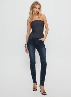 front view of model wearing Princess Polly Illyssa Mid Rise Skinny Jeans Washed Charcoal Mid Rise Jeans 