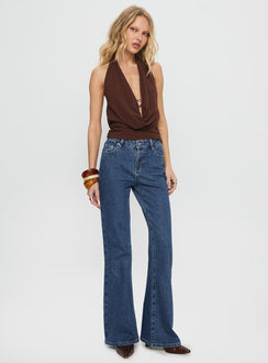 side view of model wearing Princess Polly Magic Mirror Mid Rise Bootleg Jeans Mid Blue Wash Mid Rise Jeans 