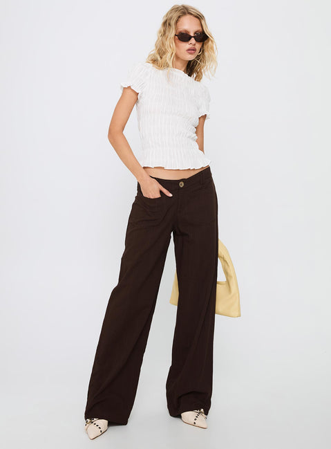 front view of model wearing Princess Polly Vendi Low Rise Pant Chocolate Low Rise Pants 