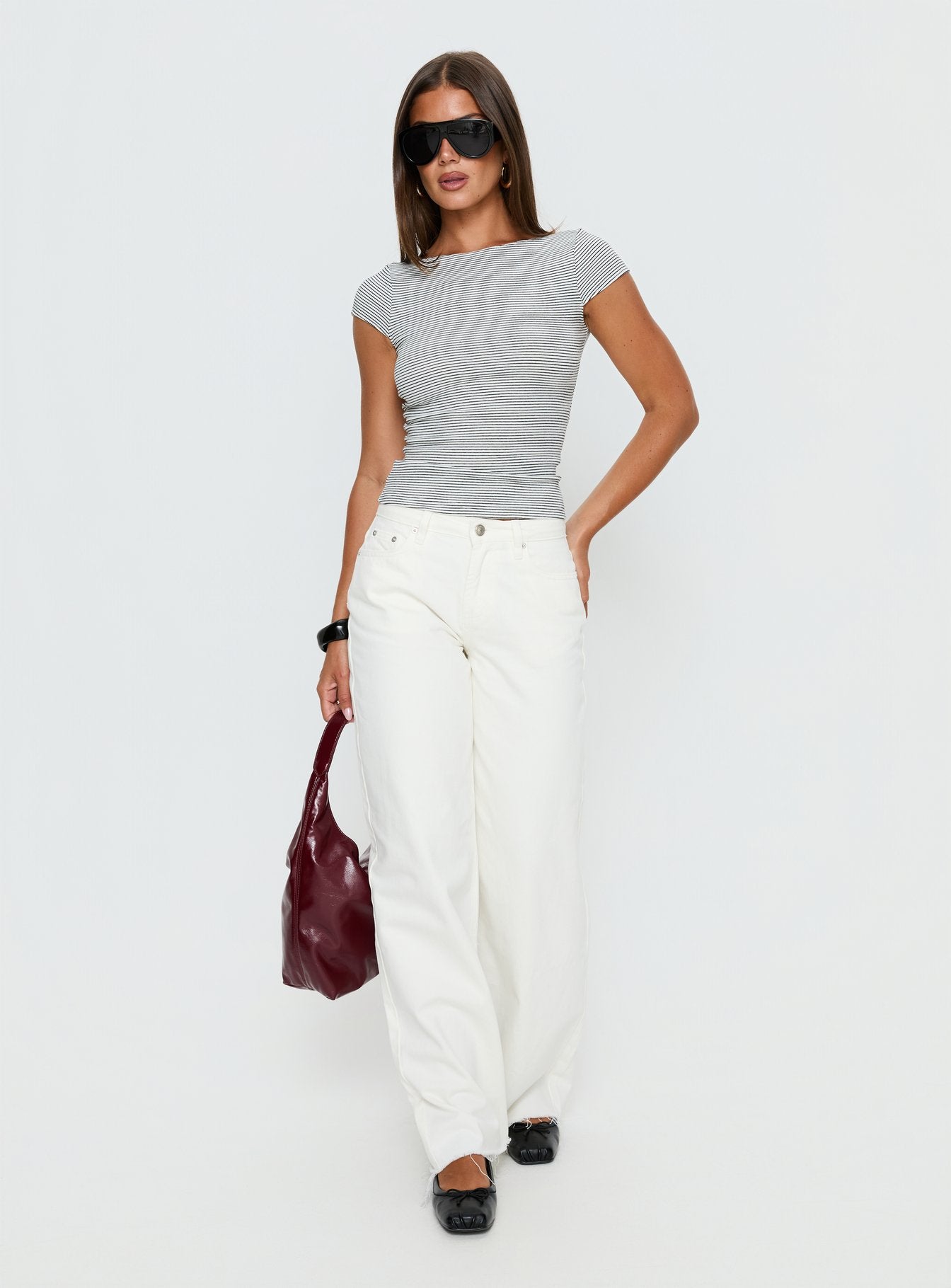 front view of model wearing Princess Polly Darla Low Rise Straight Leg Jean White Low Rise Jeans 