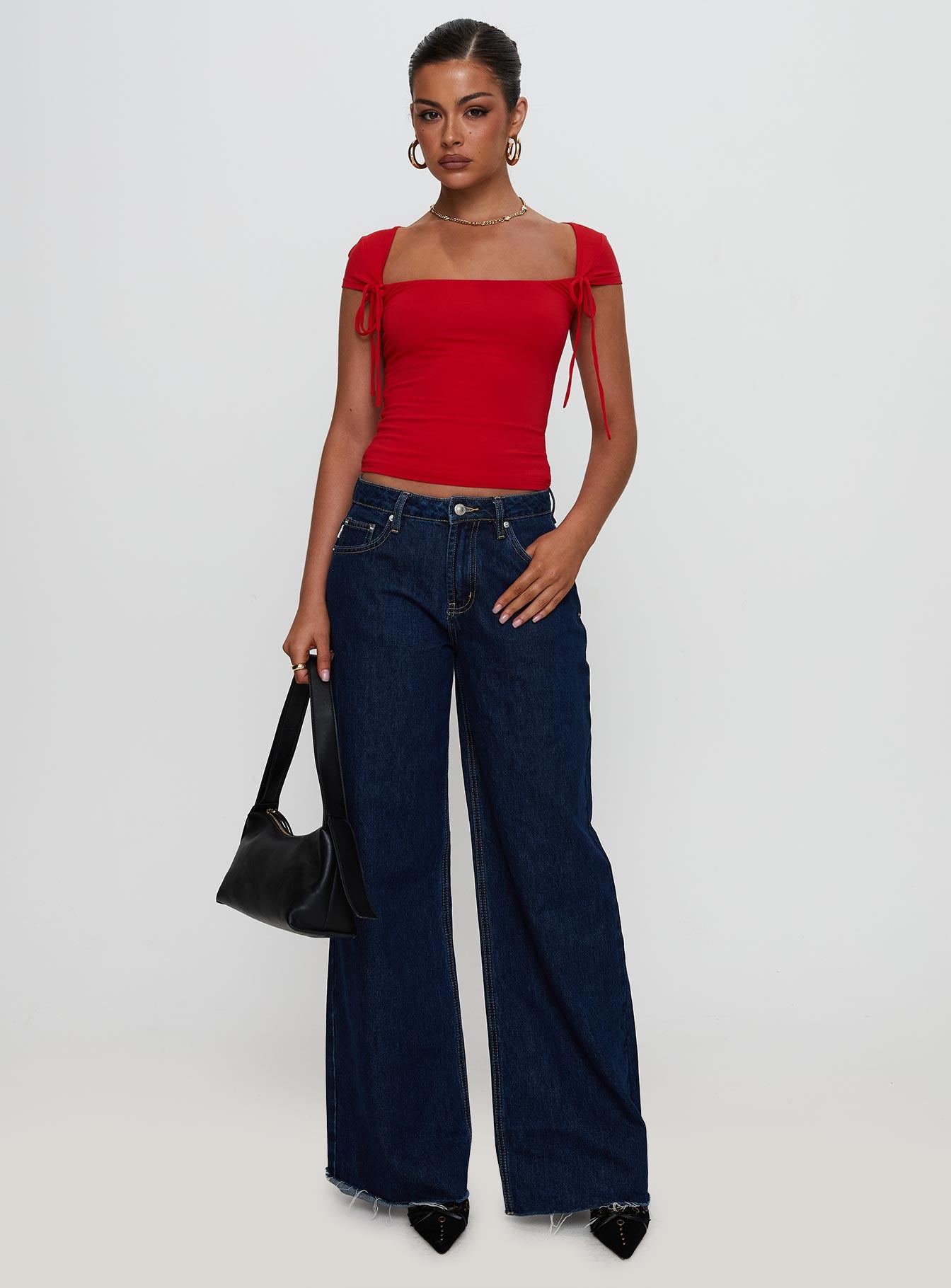 back view of model wearing Princess Polly Daena Tie Detail Top Red Short Sleeves Square Neck 