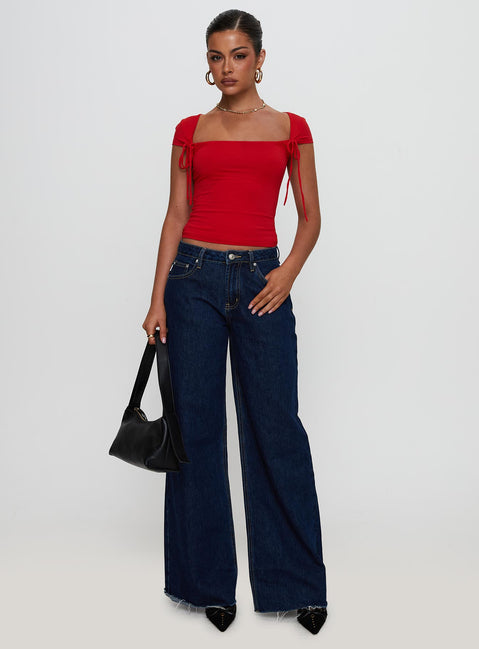 back view of model wearing Princess Polly Daena Tie Detail Top Red Short Sleeves Square Neck 