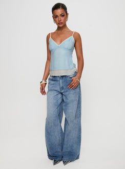 side view of model wearing Princess Polly Majorie Layered Top Blue / Cream Sleeveless V-Neck 