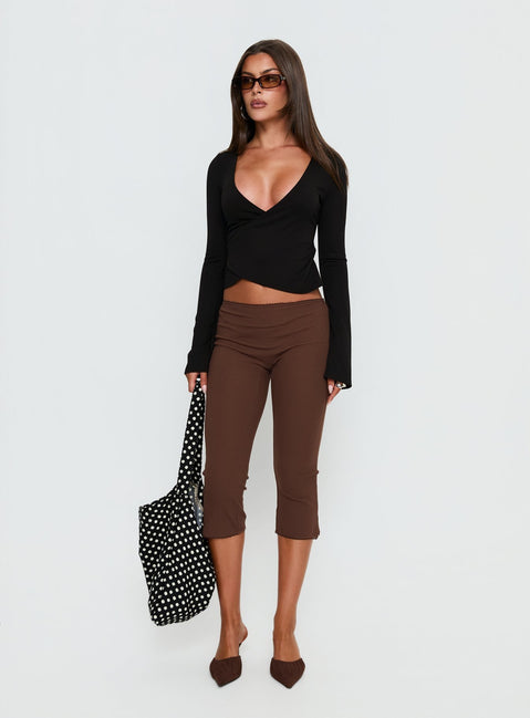 front view of model wearing Princess Polly Baseline Rib Capri Pants Chocolate Mid Rise Pants 