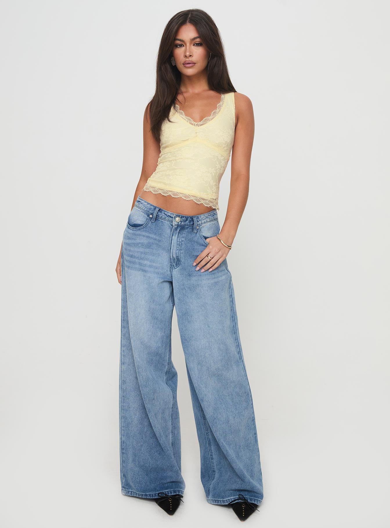 back view of model wearing Princess Polly Far Away Top Yellow Sleeveless Plunger 