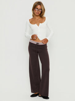 front view of model wearing Princess Polly Felisha Low Waist Knit Pants Brown Low Rise Pants 