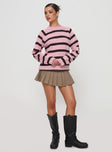 side view of model wearing Princess Polly Jacquette Knit Sweater Pink / Brown Long 