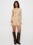 side view of model wearing Princess Polly Folklore Long Sleeve Mini Dress Cream Crew Neck 