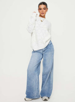 side view of model wearing Princess Polly Pierce Pointelle Sweater Cream Long 