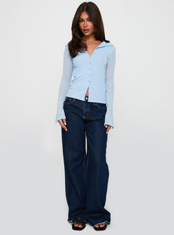 front view of model wearing Princess Polly Finnean Long Sleeve Top Pale Blue Full Sleeves V-Neck 