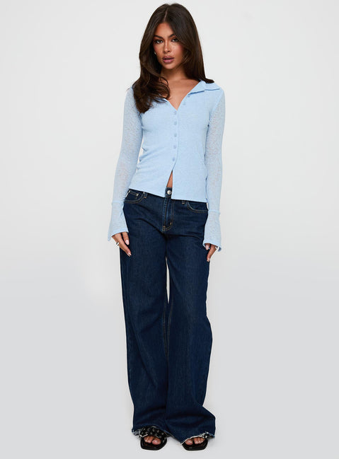 front view of model wearing Princess Polly Finnean Long Sleeve Top Pale Blue Full Sleeves V-Neck 