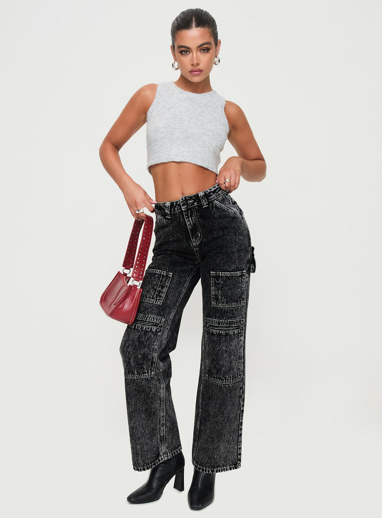 front view of model wearing Princess Polly Malachie High Rise Jeans Black Acid Wash Mid Rise 