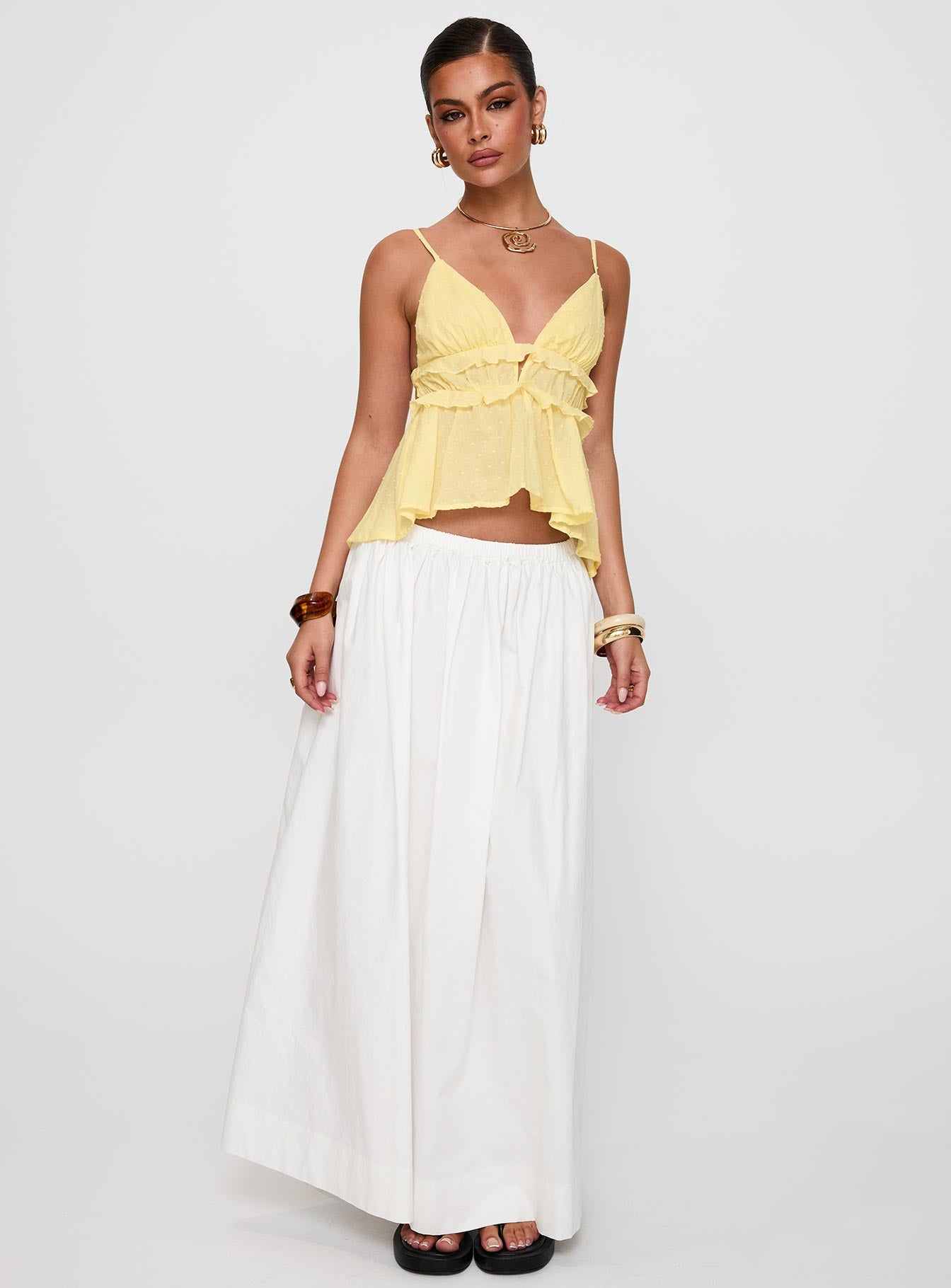 front view of model wearing Princess Polly Blondelle Frill Detail Top Yellow Sleeveless Plunger 