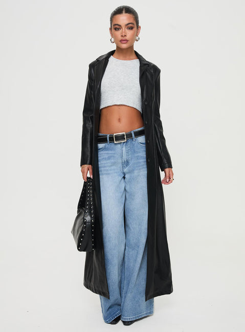 <ul> <li>Faux leather coat</li> <li>Lapel collar, button fastening down front, shoulder pads</li> </ul>