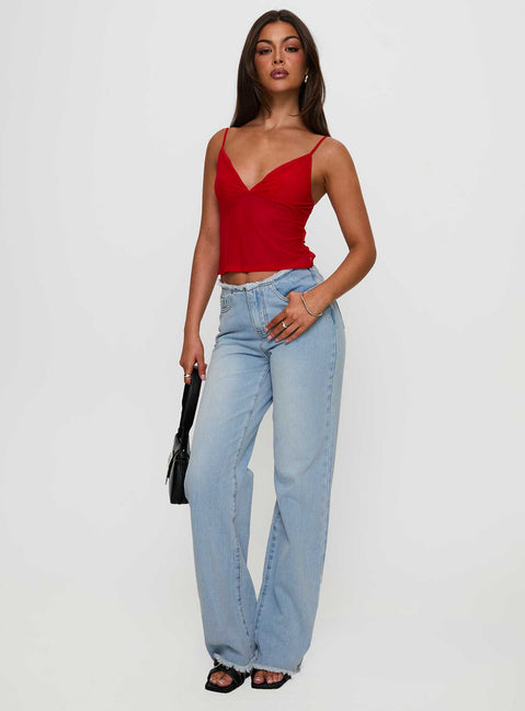 front view of model wearing Princess Polly Hawke Frayed Jeans Mid Blue High Waisted 