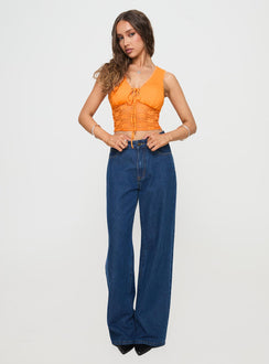 front view of model wearing Princess Polly Isolde Top Orange Sleeveless V-Neck 