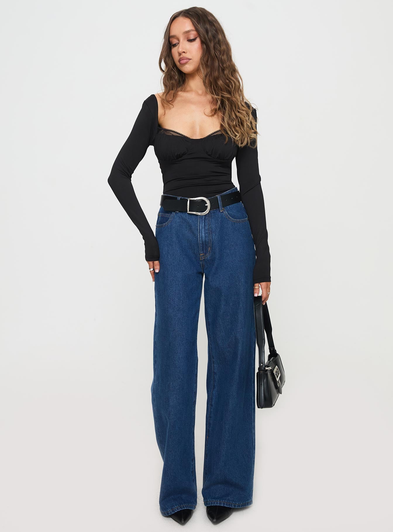 front view of model wearing Princess Polly Peekaboo Long Sleeve Bodysuit Black Full Sleeves Sweetheart 