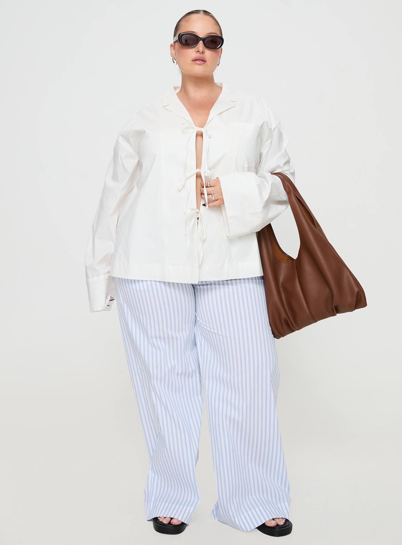 front view of model wearing Princess Polly Spiri Shirt White Curve Full Sleeves V-Neck 