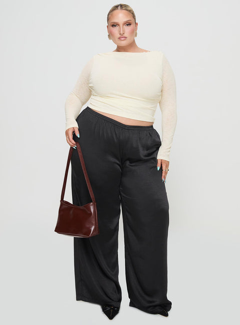 front view of model wearing Princess Polly Nixie Pants Black Curve mid-risedeselected 